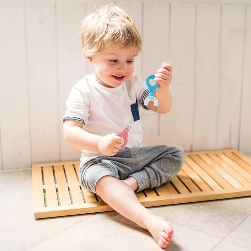 Cepillo de dientes para bebés en forma de U para niños